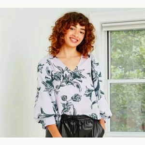 A New Day Women's Blouse. Violet Floral. Size Small. New with tagPuff Sleeve